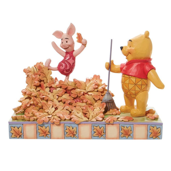 Jumping into Fall Pooh and Piglet in Leaves